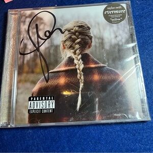 Autographed Taylor Swift Evermore album